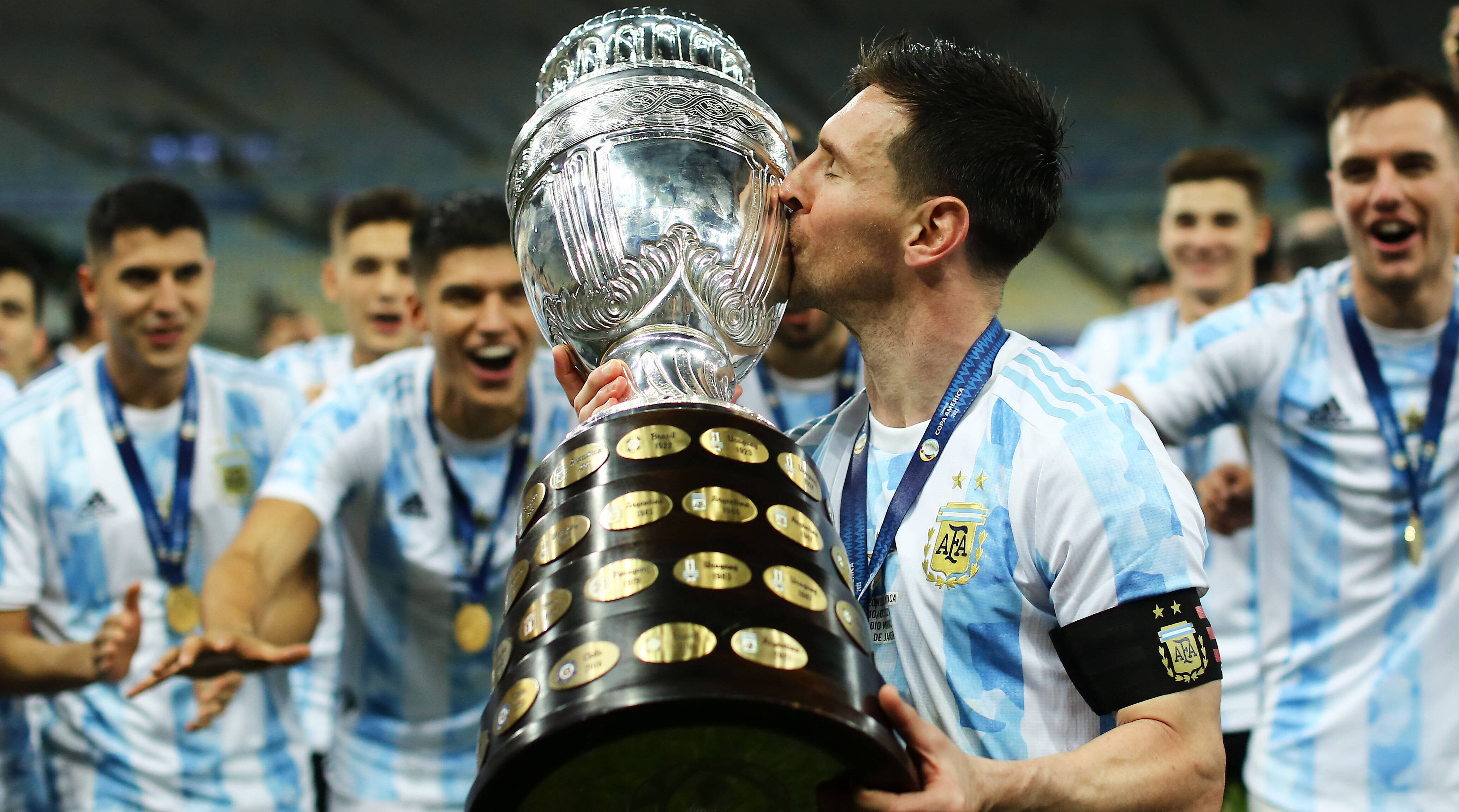 Lionel Messi kissing the Copa America.